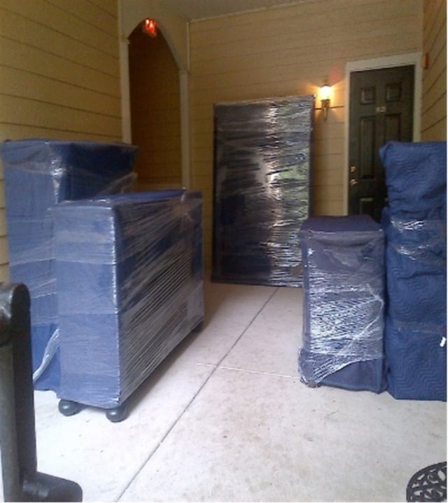 Good Move Movers use moving blankets and shrink wrap on furniture before they begin moving services