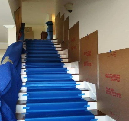 Good Move Movers protect stair cases before they begin moving services